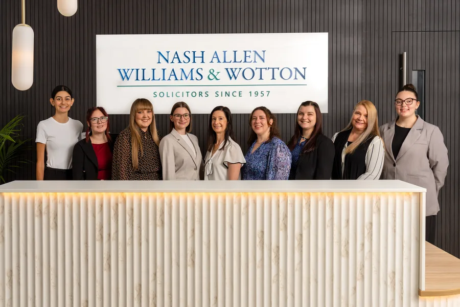 The Nash Allen Williams & Wotton team at the firm's front desk